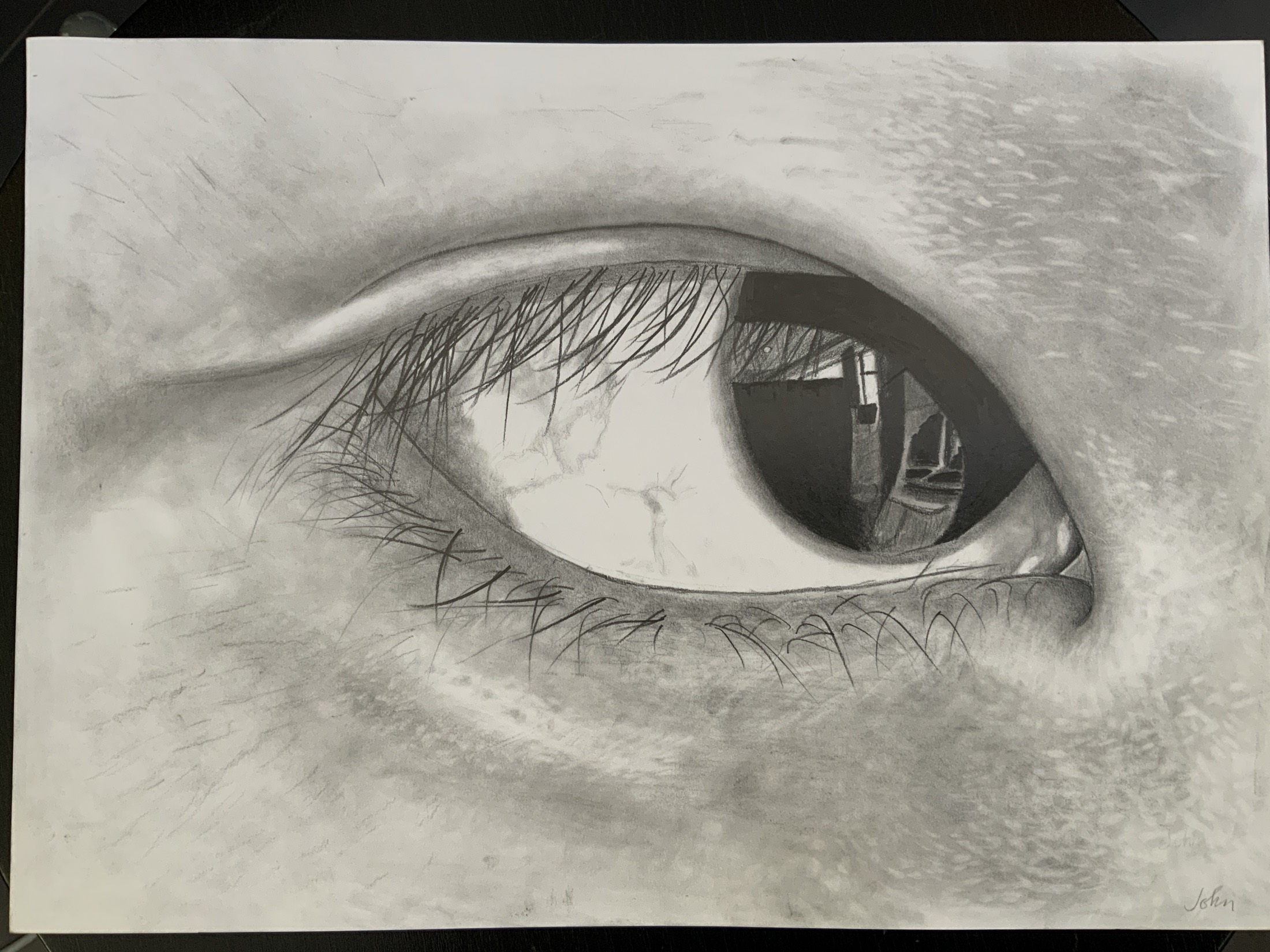 Detailed charcoal eye drawing