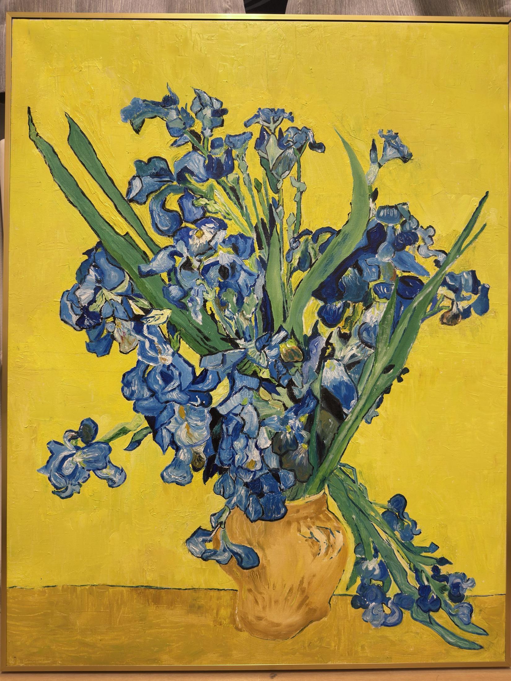 Blue flowers painting on a bright yellow background